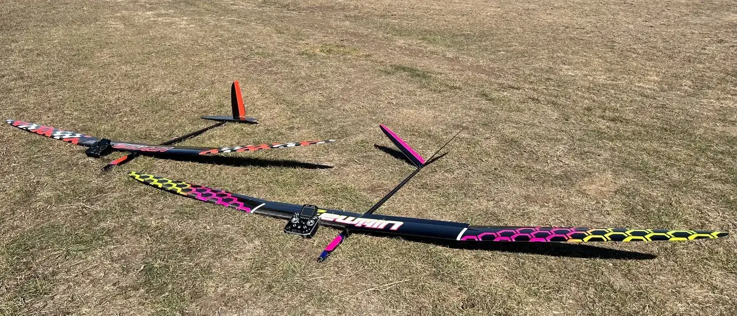 SLNT sailplanes lined up at the field